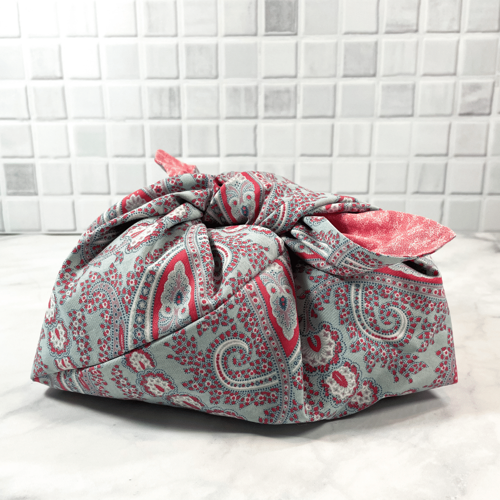Here is a reusable cotton tie bag.  These bags have a multitude of uses, just check out this blog to learn the many ways you can use this amazing bag.  It's washable, handmade and oh so pretty!