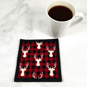 Mug rugs are also known as drink coasters.  They are made from 100% cotton fabric, are insulated and washable too.  These are great accessories for your home office desk or for your coffee bar area.  This particular one is made with a deer head and buffalo plaid fabric as the main material.