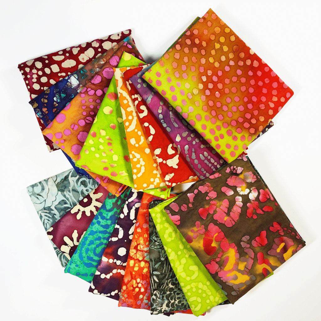 This monthly fat quarter subscription box comes with 7 fat quarters of 100% cotton batik.  You will get a nice variety each month all tied with a bow and delivered right to your door.  These make great gifts for the quilter in your life so they can build their fabric stash.