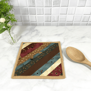 These are rustic country themed quilted potholders for your home.  The trivets are made from 100% cotton fabric and are washable.  Practical, yet beautiful when used as hot pads on your kitchen island or dining table.