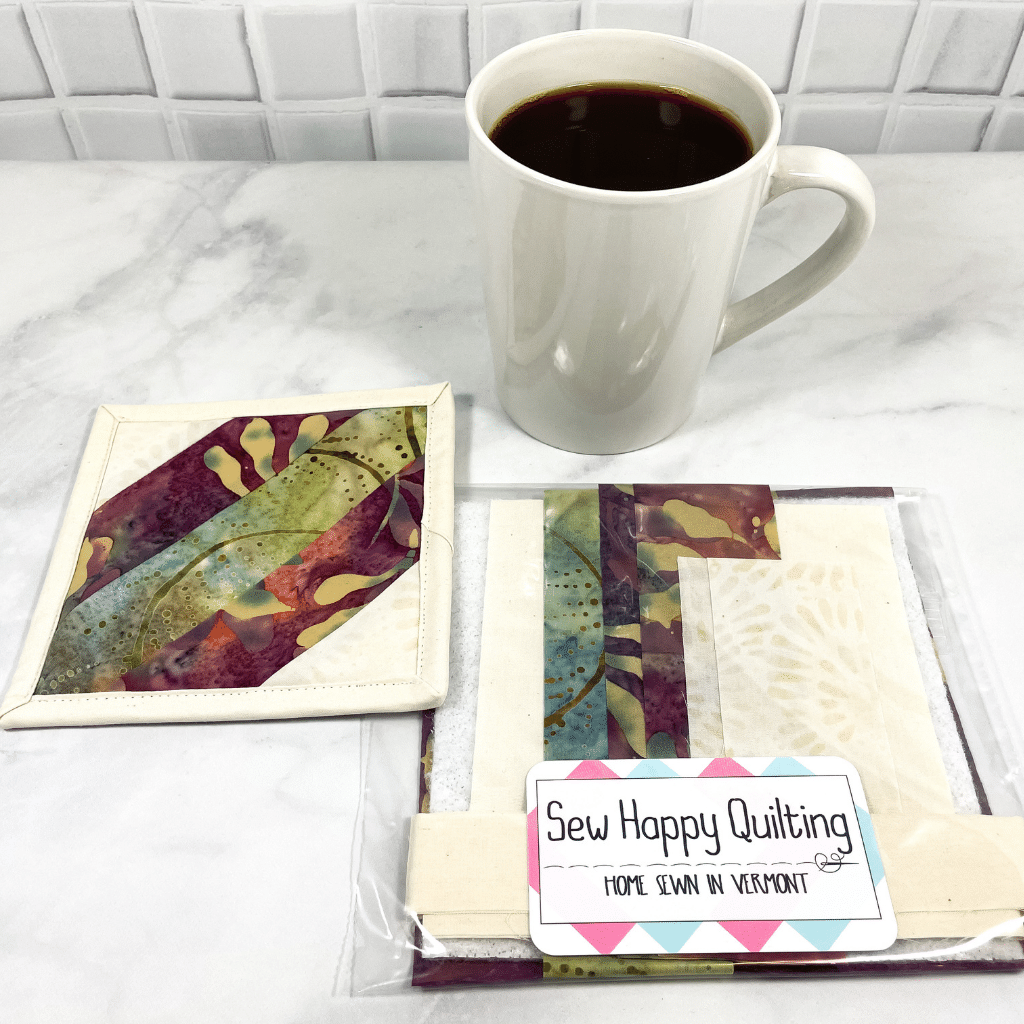 This is a mug rug quilting craft kit that includes all the batik fabric and printed directions you need to make one drink coaster.  It’s a project you will get to admire on your coffee table, desk or home coffee bar.  It makes a great weekend DIY project for crafty adults.  Click to find out more about this quilt kit.