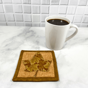 These maple leaf mug rugs are also known as drink coasters.  They are made from 100% cotton fabric, are insulated and washable.  These are great accessories for your home office desk or for your coffee bar area, adding a splash of color and uniqueness.