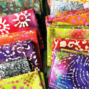 These batik fat quarter bundle grab bags have been hugely popular. You get 7 random fat quarters that are so fun and beautiful. Everyone loves the variety, making them a best seller for Sew Happy Quilting.