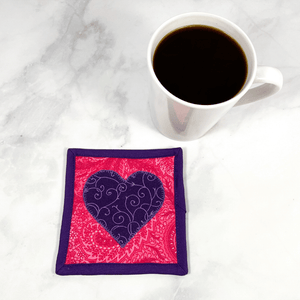 These heart themed mug rugs aka drink coasters make a great gift for Valentine's Day or just to say I love you.  They are made from 100% cotton fabric, are insulated and washable.  These are great accessories for your home office desk or for your coffee bar area, adding a splash of color and uniqueness.
