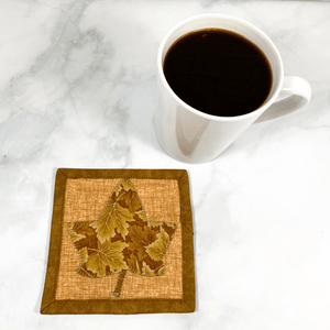 These maple leaf mug rugs are also known as drink coasters.  They are made from 100% cotton fabric, are insulated and washable.  These are great accessories for your home office desk or for your coffee bar area, adding a splash of color and uniqueness.