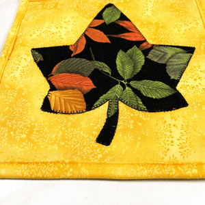 These are maple leaf themed quilted potholders for your home.  The trivets are made from 100% cotton fabric and are washable.  Practical, yet beautiful when used as hot pads on your kitchen island or dining table.