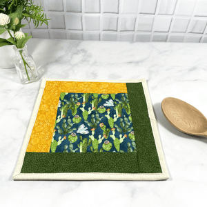 These are gorgeous cactus themed quilted potholders for your home.  The trivets are made from 100% cotton fabric and are washable.  Practical, yet beautiful when used as hot pads on your kitchen island or dining table.