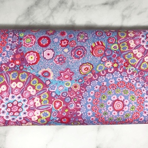 Kaffe Fassett Millefiore pattern in pink color is a very popular 100% cotton designer fabric.  This material is very popular for making quilts, tote bags, pillows and more.  Get yours today before it sells out.