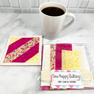 This is a mug rug quilting craft kit that includes all the fabric and printed directions you need to make one drink coaster.  It’s a project you will get to admire on your coffee table, desk or home coffee bar.  It makes a great weekend DIY project for crafty adults.  Click to find out more about this quilt kit.