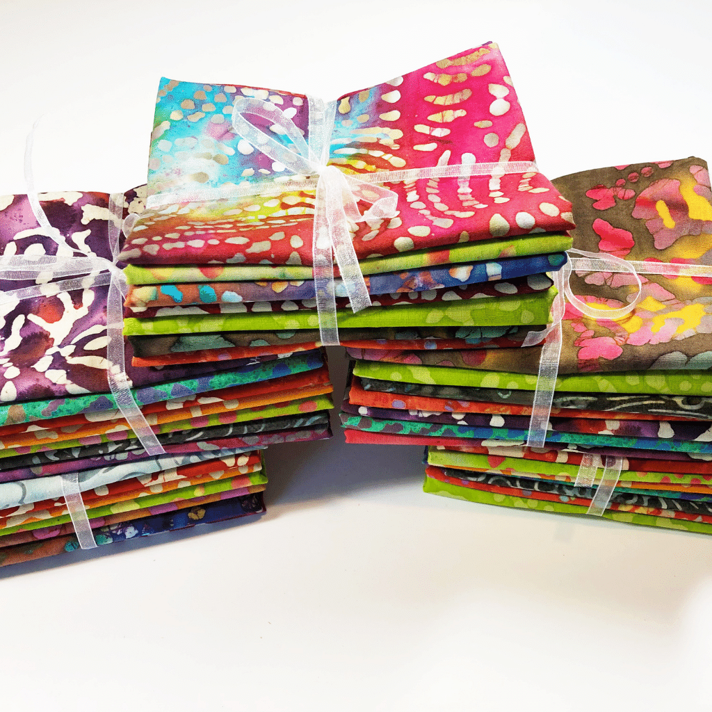These batik fat quarter bundle grab bags have been hugely popular.  You get 7 random fat quarters that are so fun and beautiful.  Everyone loves the variety, making them a best seller for Sew Happy Quilting.