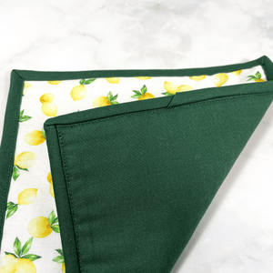These are gorgeous lemon citrus themed quilted potholders for your home.  The trivets are made from 100% cotton fabric and are washable.  Practical, yet beautiful when used as hot pads on your kitchen island or dining table.