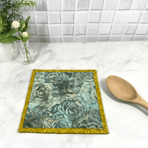 These are gorgeous blue and yellow batik fabric quilted potholders for your home.  The trivets are made from 100% cotton fabric and are washable.  Practical, yet beautiful when used as hot pads on your kitchen island or dining table.