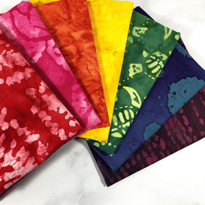 This monthly fat quarter subscription box comes with 7 fat quarters of 100% cotton batik.  You will get a nice variety each month all tied with a bow and delivered right to your door.  These make great gifts for the quilter in your life so they can build their fabric stash.